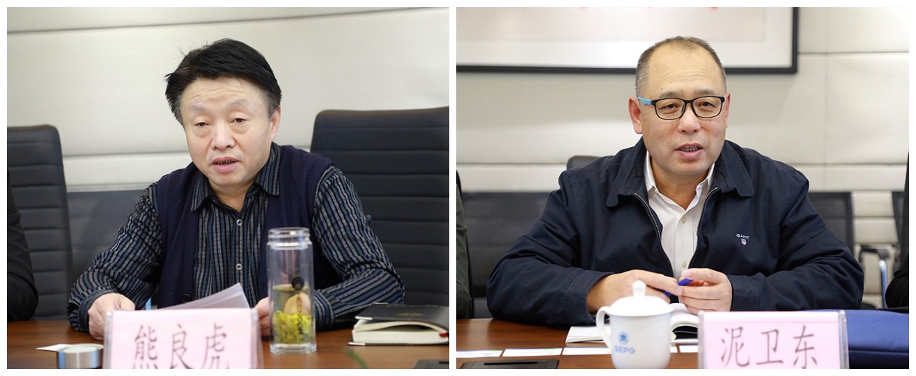 熊良虎会见中建材（北京）J9集团平台公司董事长泥卫东